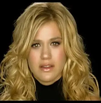 Lirik Lagu Because Of You dan Terjemahan - Kelly Clarkson